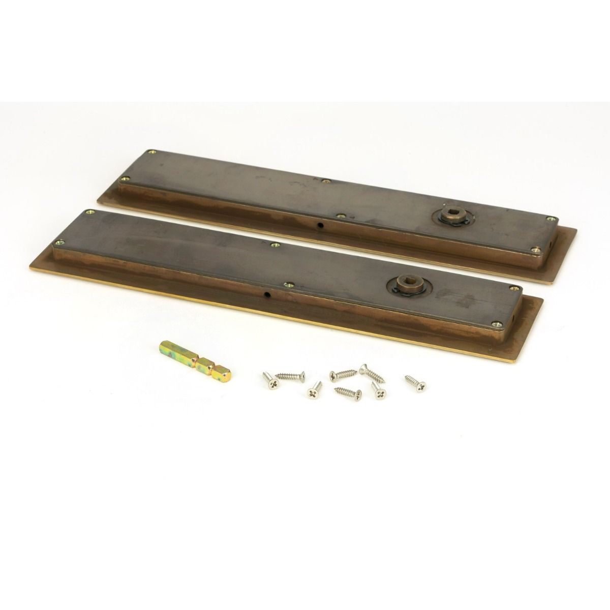 The 250mm Art Deco Rectangular Sliding Pocket Door Privacy Set in Aged Brass Shown from Behind with Supplied Screws and Spindle