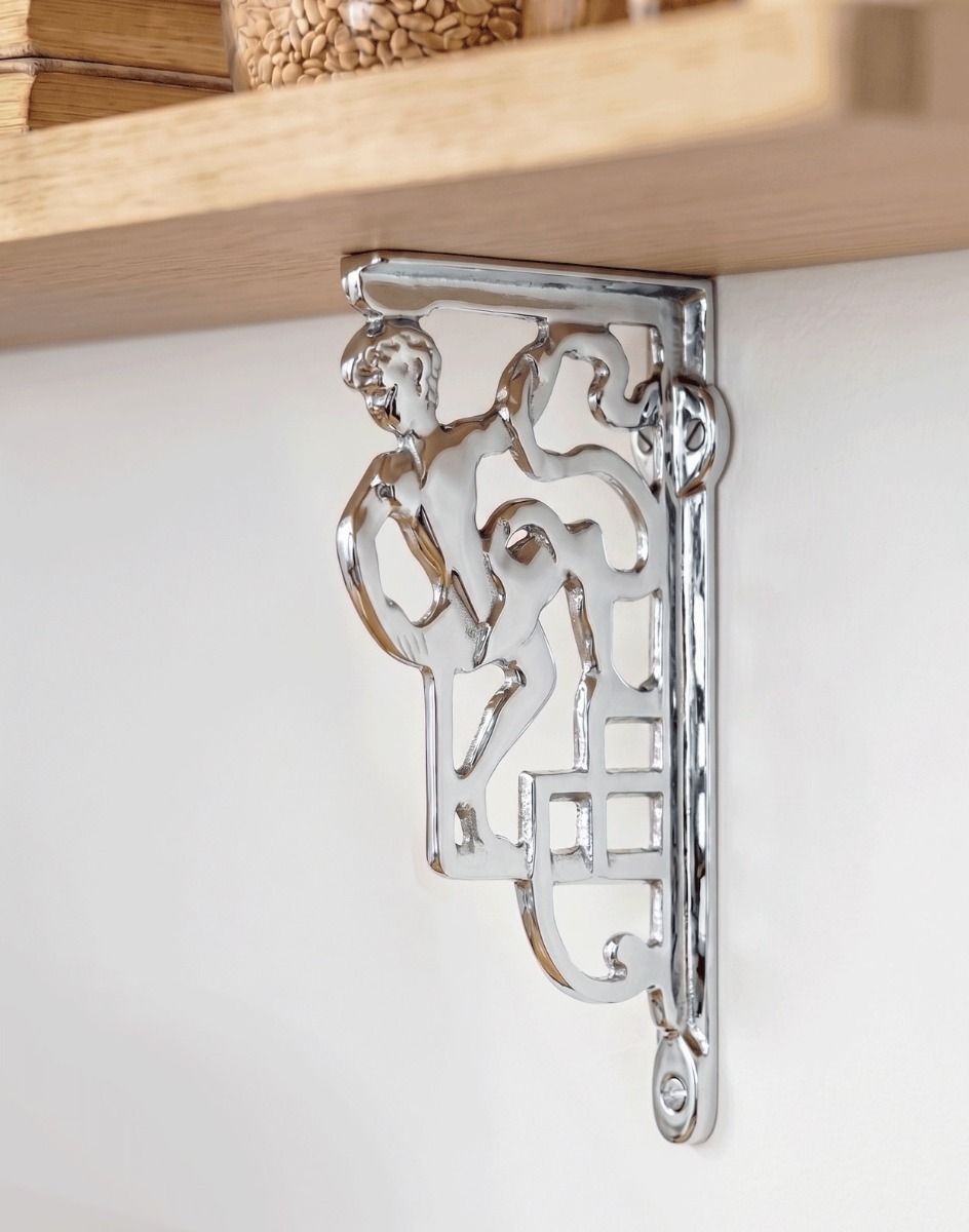 The 25 x 12cm Bright Chrome Climbing Man Design Bracket on a Clean white Modern Living Room Wall - Digital Illustration 