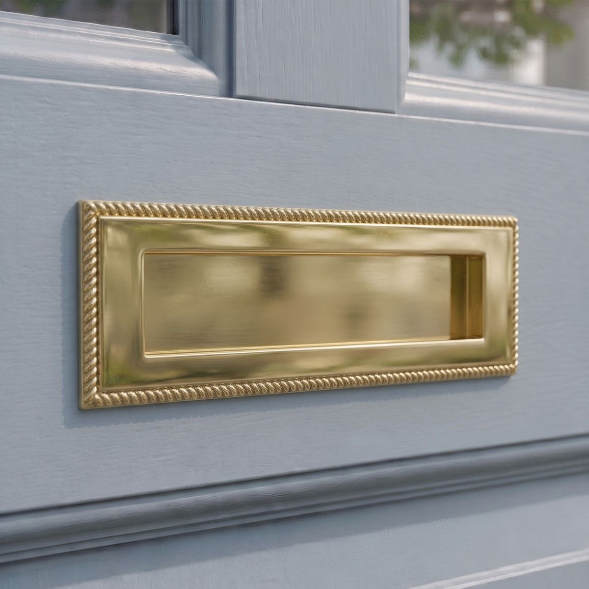 The 25cm Polished Brass Georgian Style Letter Plate on a Light Blue Front Door on a Modern Home - Digital Illustration