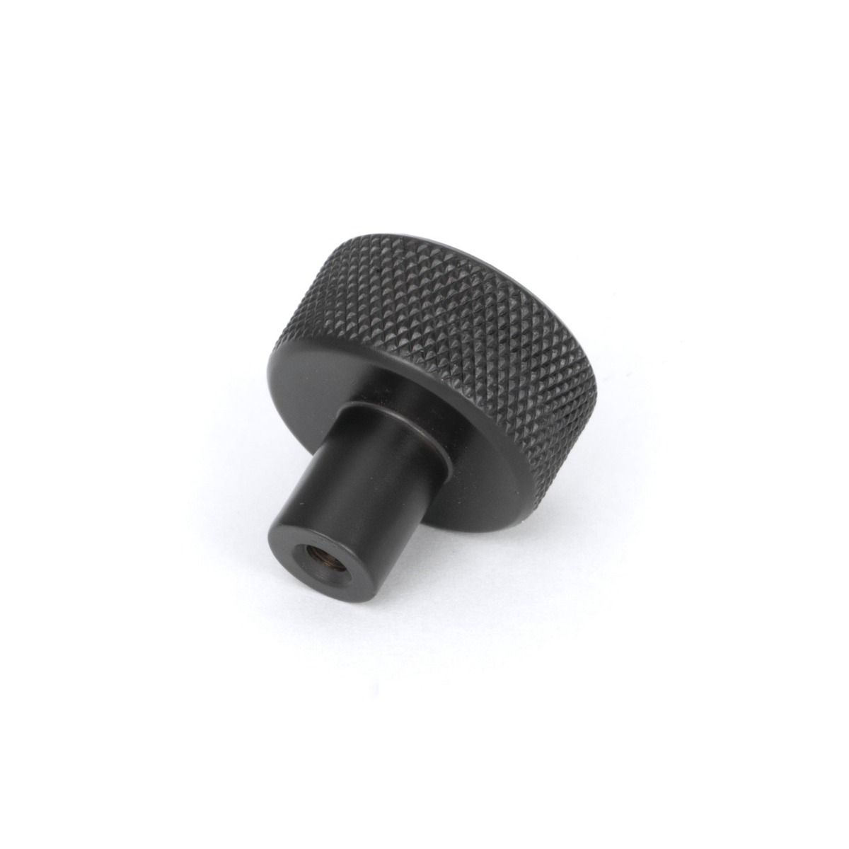 The 25mm Knurled Cabinet Knob (No Rose) in Aged Bronze Seen from Behind on a White Background 