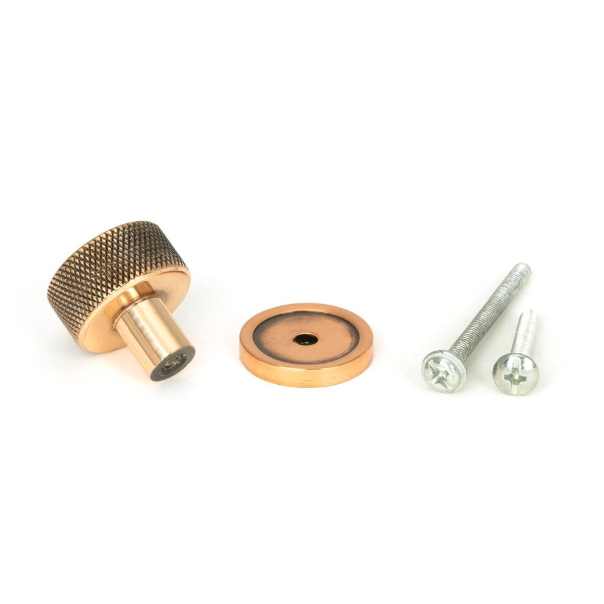 The 25mm Knurled Cabinet Knob on a Plain Rose in Polished Bronze with Fitting Bolt on a White Background 