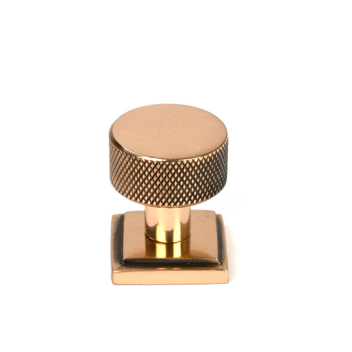 The 25mm Knurled Cabinet Knob on a Square Rose in Polished Bronze Shown Upright on a White Background 