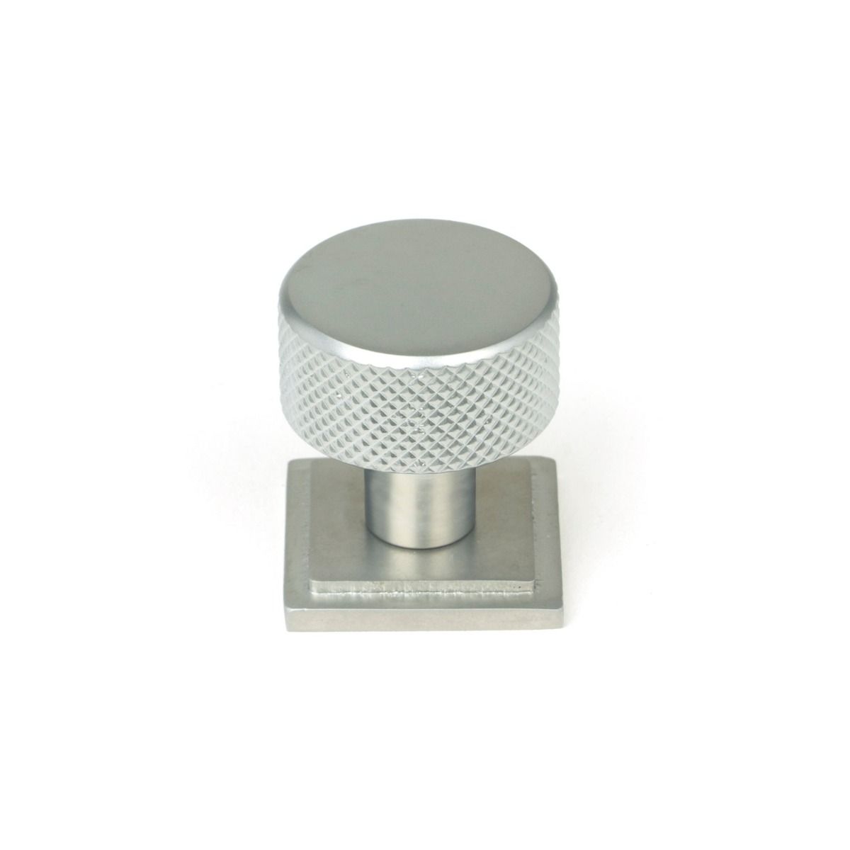 The 25mm Knurled Cabinet Knob on a Square Rose in Satin Chrome Shown Upright on a White Background