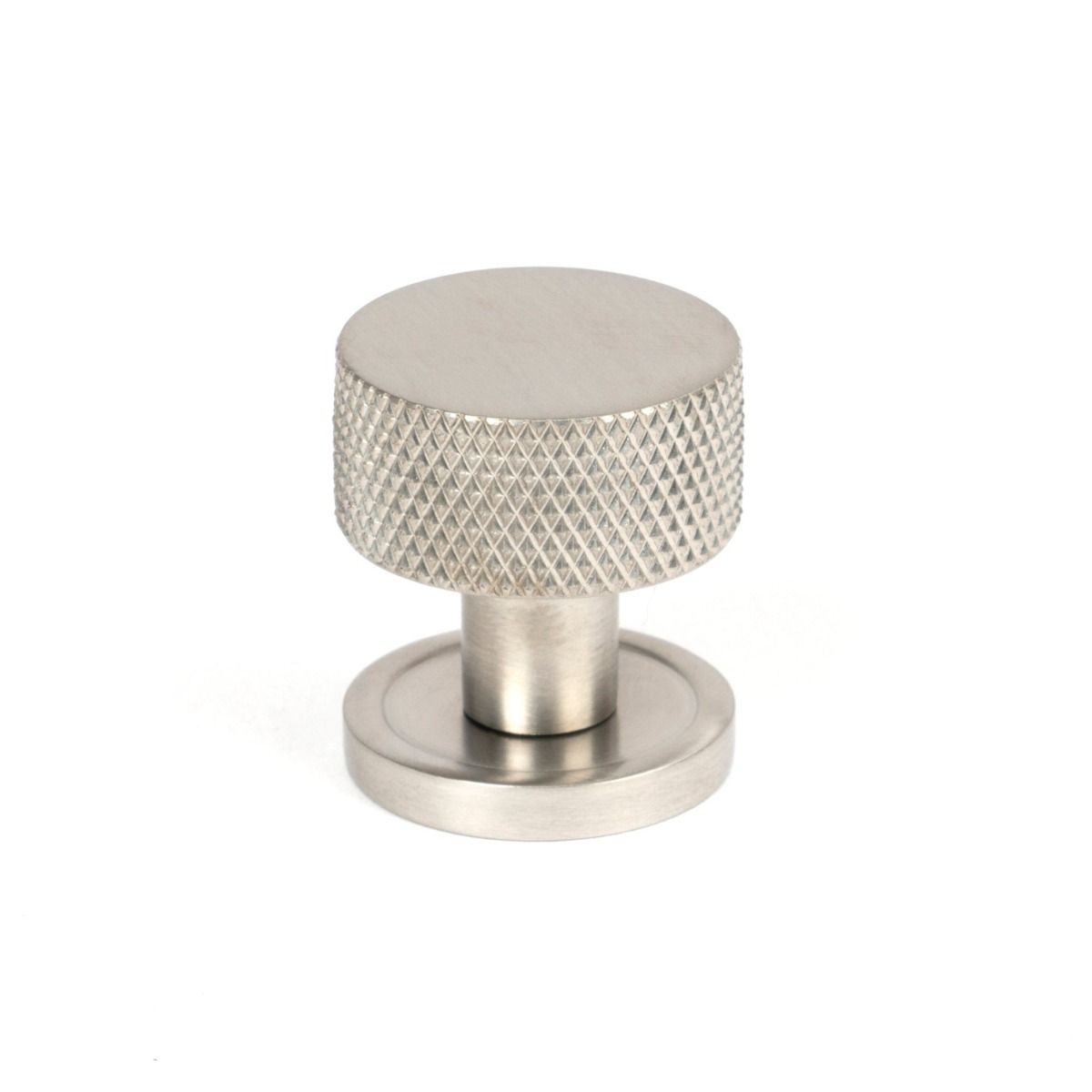 The 25mm Knurled Cabinet Knob on Plain Rose in Satin Stainless Steel Shown Upright on a White Background