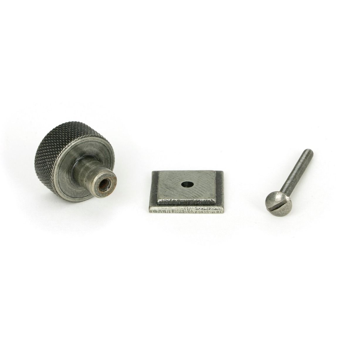 The 25mm Knurled Cabinet Knob on Square Rose in Pewter Displayed with Fitting Bolt