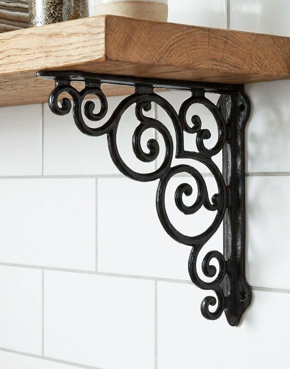 The 27 x 25cm "Paradise House" Cast Iron Scroll Shelf Bracket Mounted on a White Tiled Kitchen Wall in a Modern Home - Digital Illustration
