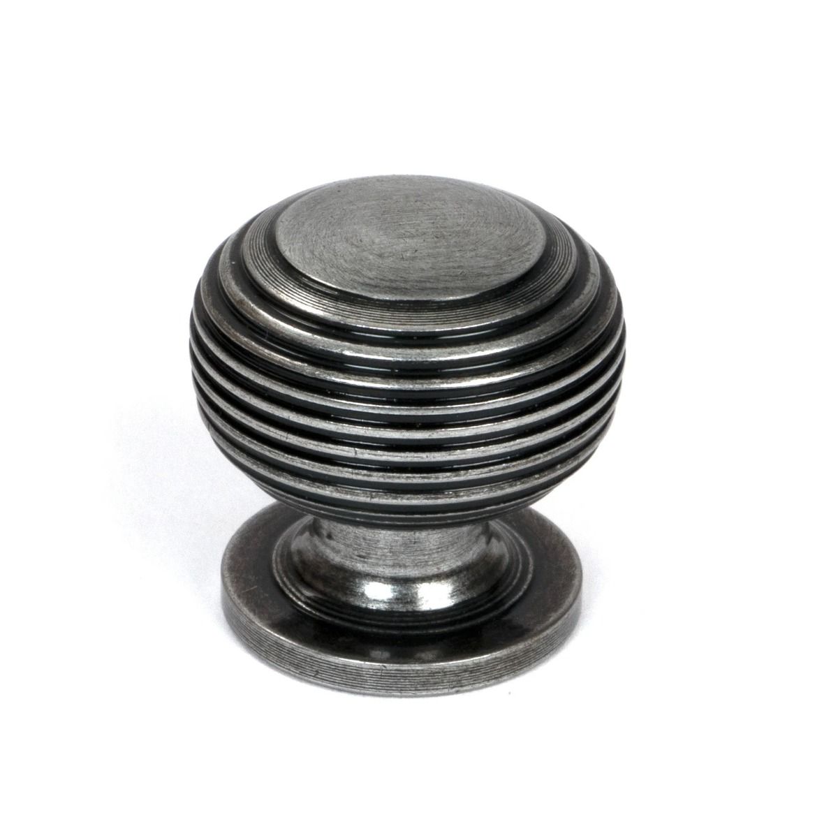 The 30mm "Garrison" Ribbed Beehive Knob in Pewter on a Whitebackground Shown Stood Upright