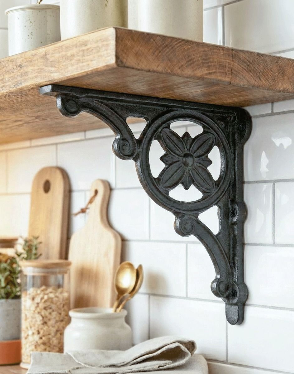 The 31cm x 28cm "Delpi" Iron Shelf Bracket Mounted on a White Tiled Kitchen Wall Supporting a Wooden Shelf - Digital Illustration 