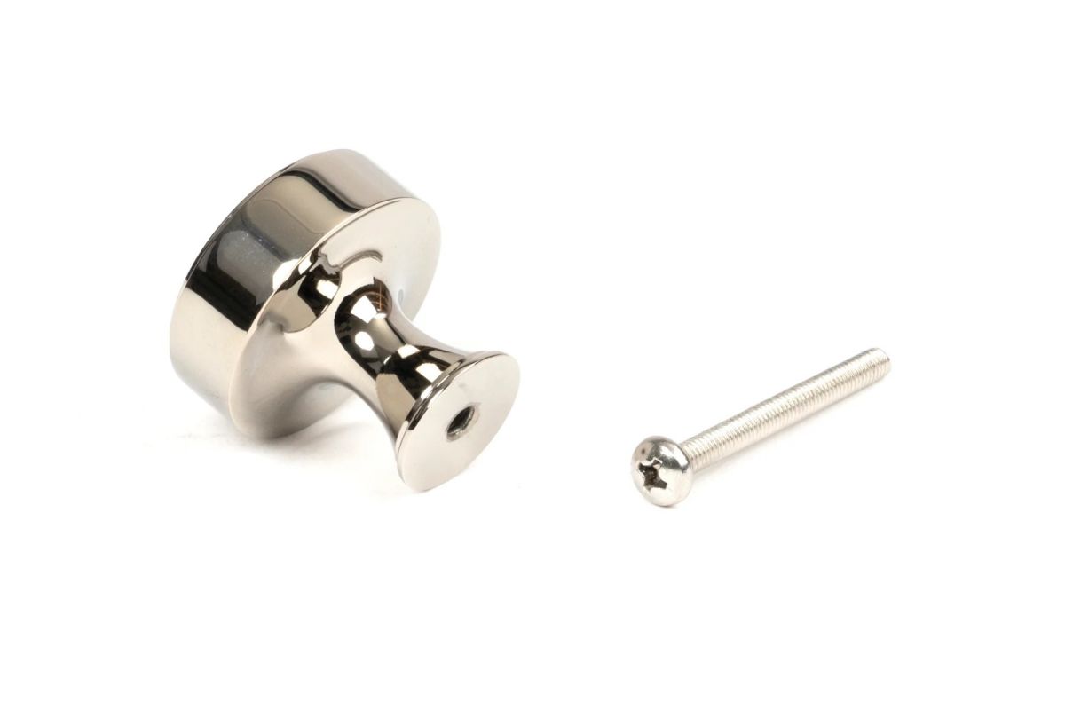 The 32mm "Atelier" Circular Cabinet Knob in Polished Nickel on a White Background Shown from Behind with the Screw
