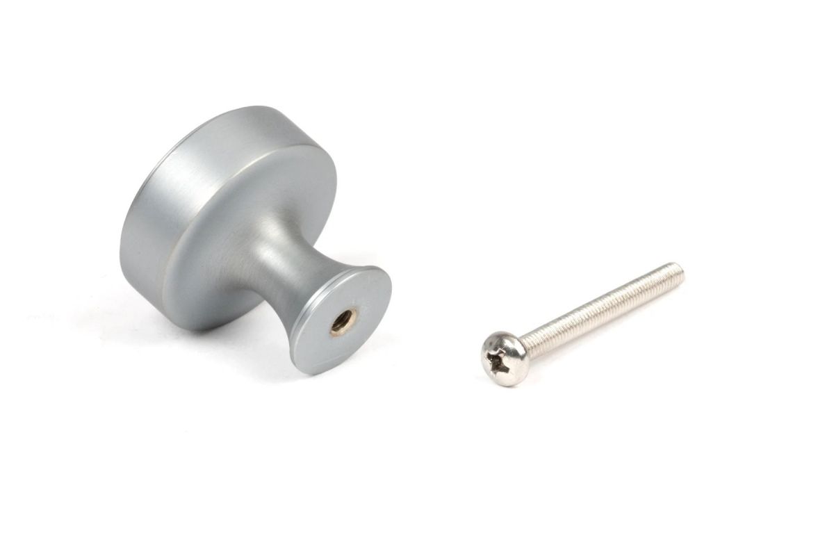 The 32mm "Atelier" Circular Cabinet Knob in Satin Chrome on a White Background Shown From Behind with the Screw