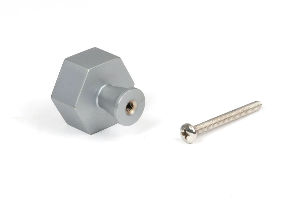 The 32mm "Vanguard" Hexagonal Cabinet Knob in Satin Chrome on a White Background Seen from Behind with the Screw