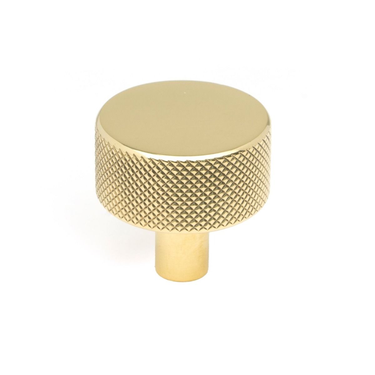 The 32mm Knurled Cabinet Knob (No Rose) in Polished Brass Shown Upright on a White Background 