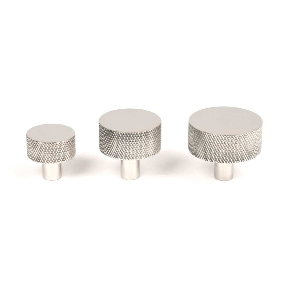 The 32mm Knurled Cabinet Knob (No Rose) in Polished Stainless Steel Alongside Different Sizes