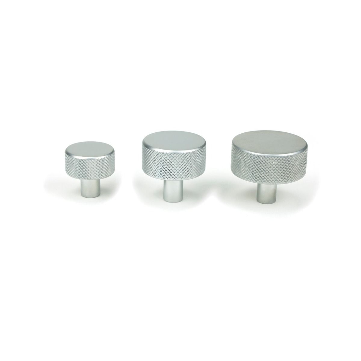 The 32mm Knurled Cabinet Knob (No Rose) in Satin Chrome Alongside Different Sizes