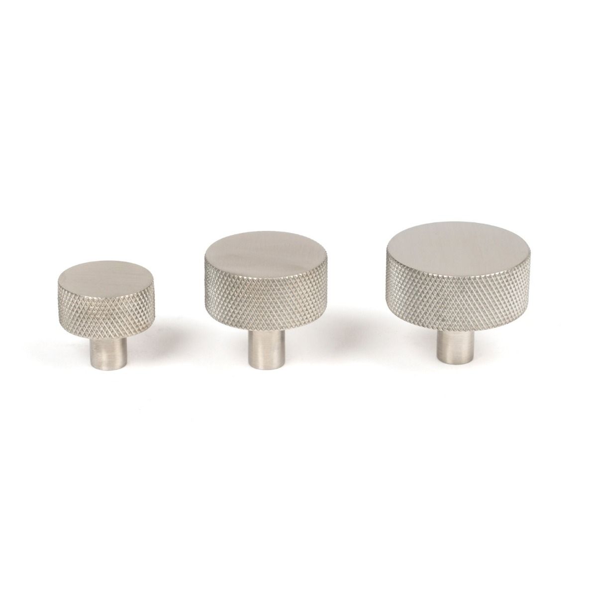 The 32mm Knurled Cabinet Knob (No Rose) in Satin Stainless Steel Alongside Different Sizes