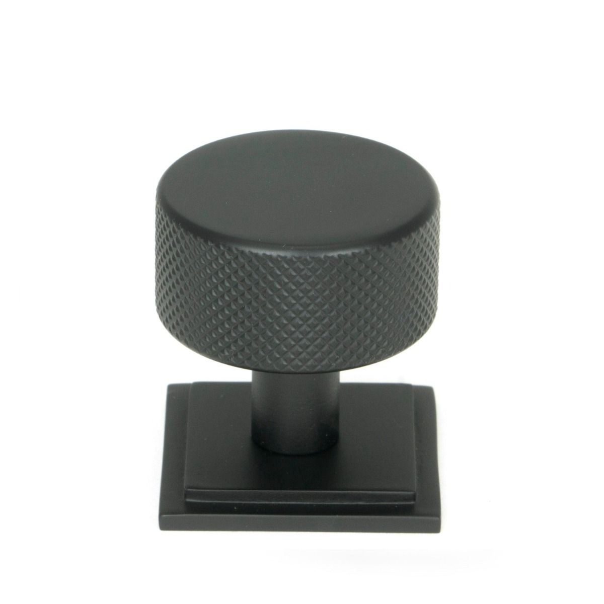 The 32mm Knurled Cabinet Knob on Square Rose in Matt Black Shown Upright on a White Background