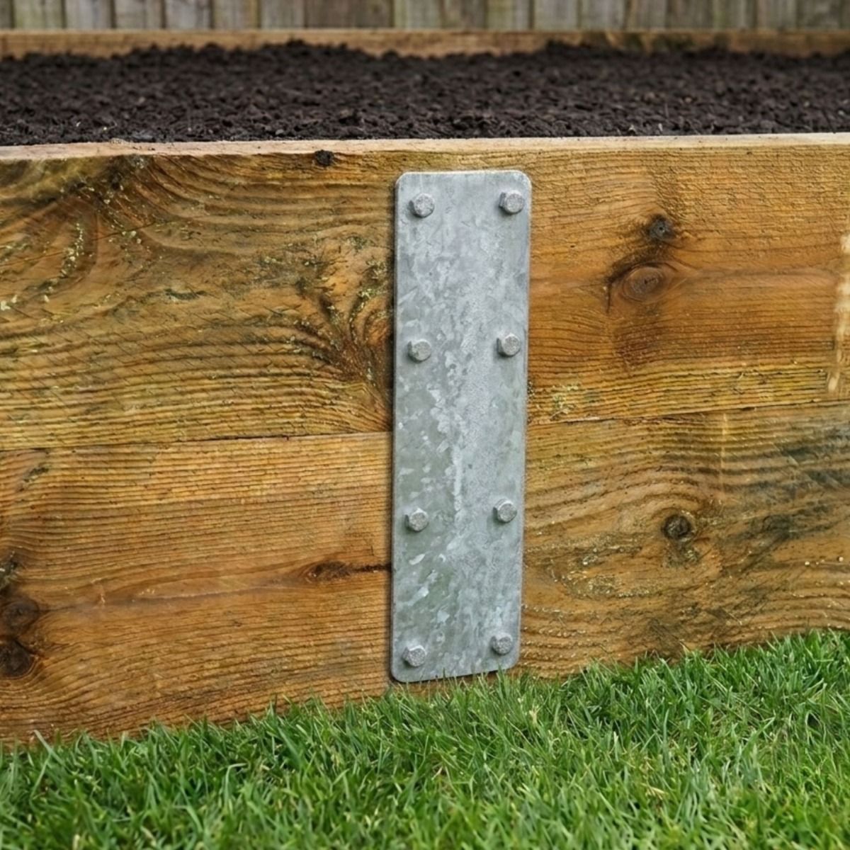 The 350mm Pre-Galvanised Railway Sleeper Straight Joining Plate on a Wooden Timber Raised Garden Planter - Digital Illustration