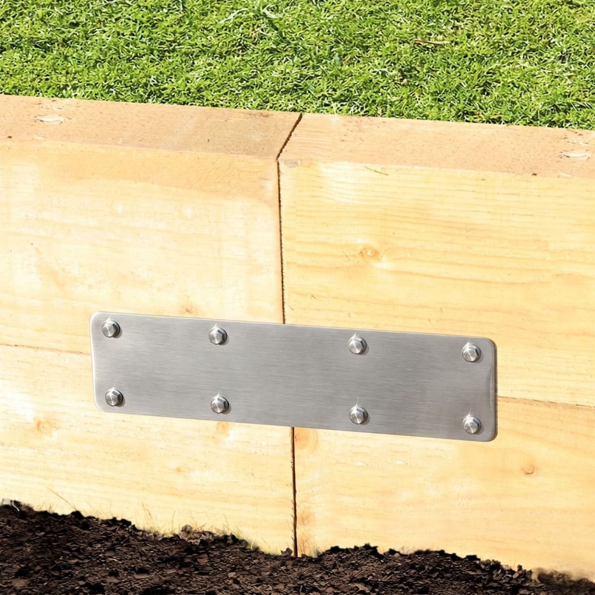 The 350mm Stainless Steel Railway Sleeper Straight Joining Plate Shown Fitted to a Raised Planter Bed