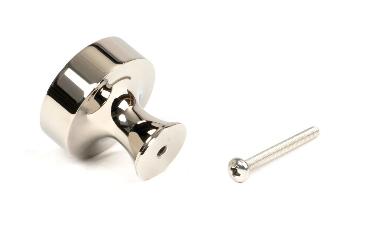 The 38mm "Atelier" Circular Cabinet Knob in Polished Nickel on a White Background Shown from Behind with the Screw