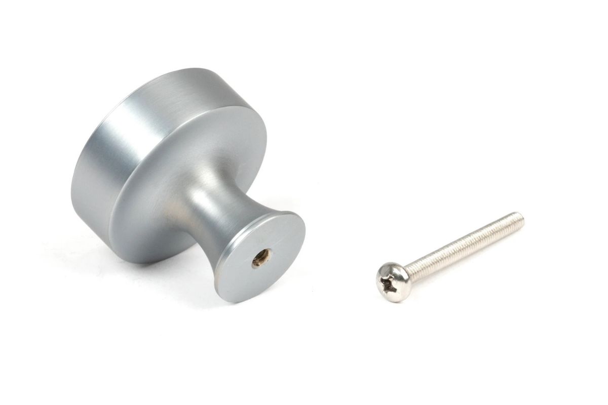 The 38mm "Atelier" Circular Cabinet Knob in Satin Chrome on a White Background Shown from Behind with the Screw