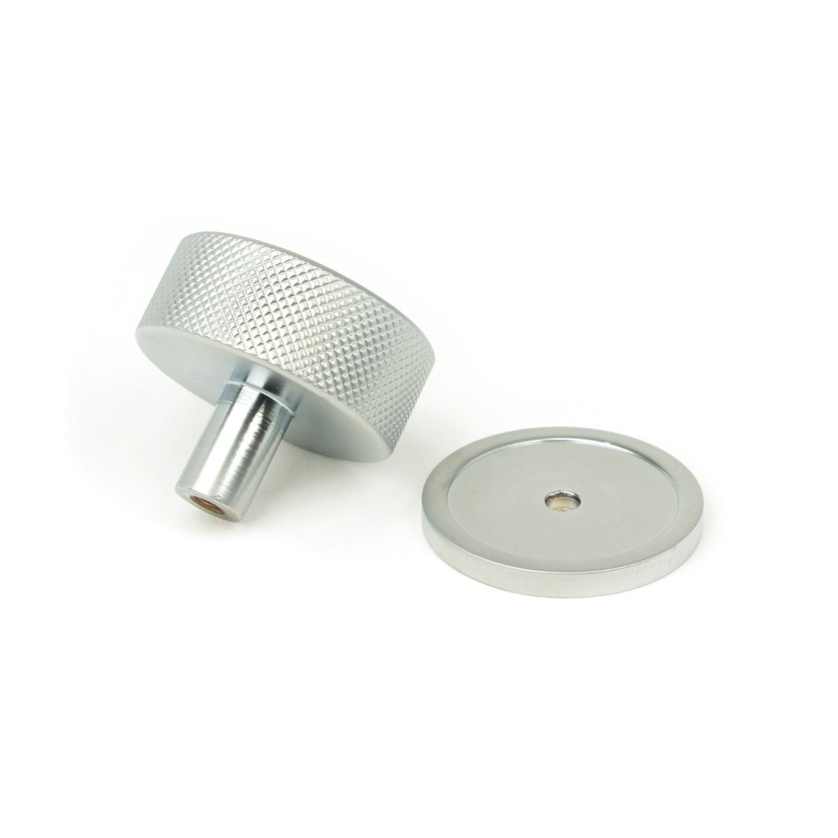 The 38mm Knurled Cabinet Knob on a Plain Rose in Satin Chrome Shown from Behind on a White Background