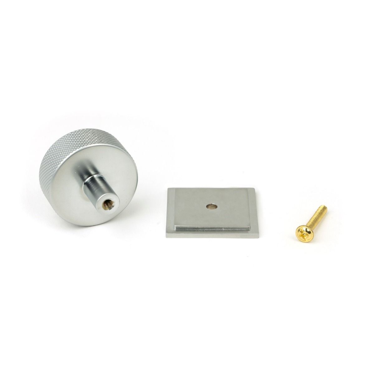 The 38mm Knurled Cabinet Knob on a Square Rose in Satin Chrome Shown with Supplied Fittings