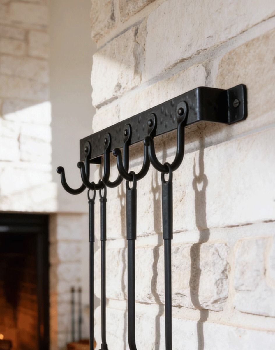 The 5 Hook "Blacksmith Style" Wall Mounted Fireside Tool Rack Mounted on a Traditional White Brick Wall in a Rustic Home - Digital Illustration