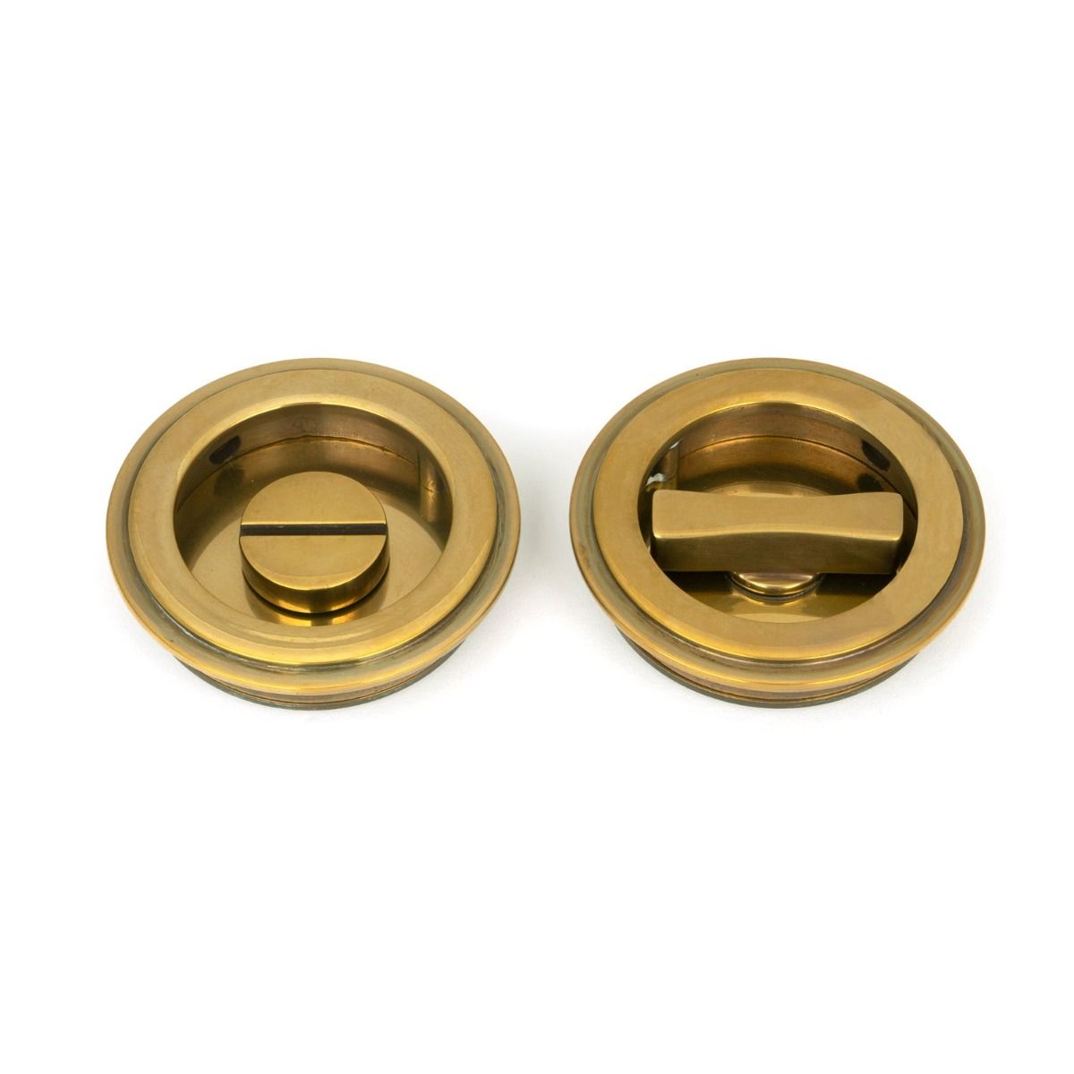 The 60mm Art Deco Round Sliding Pocket Door Privacy Set in Aged Brass on a White Background Showing Both Sections Side by Side