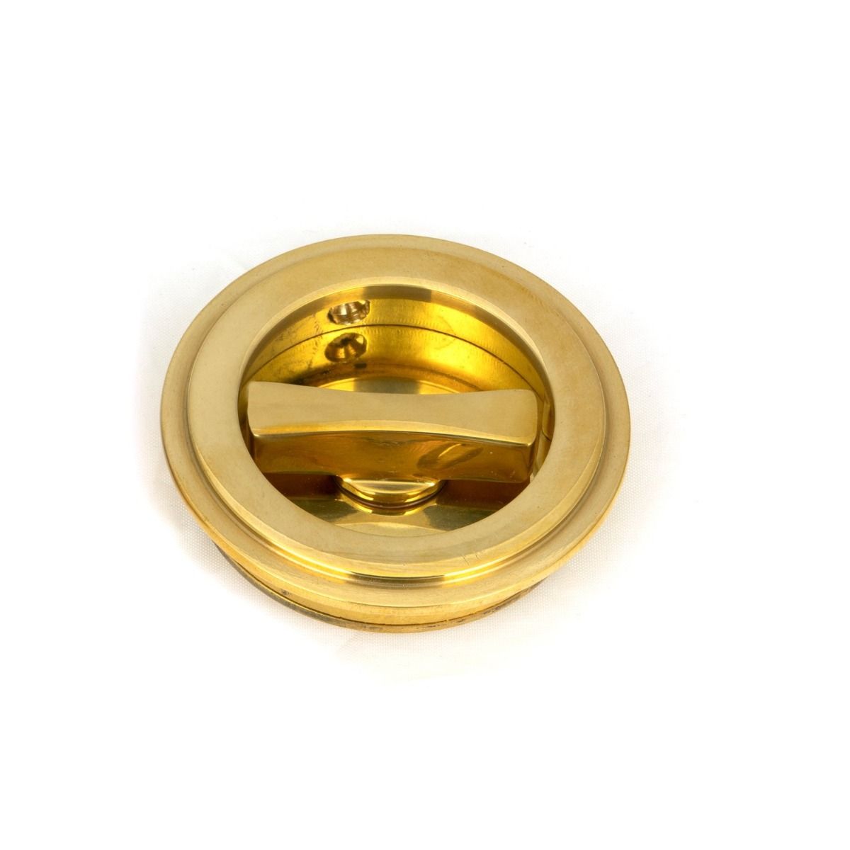 The 60mm Art Deco Round Sliding Pocket Door Privacy Set in Polished Brass Showing a Close up of the Thumbturn