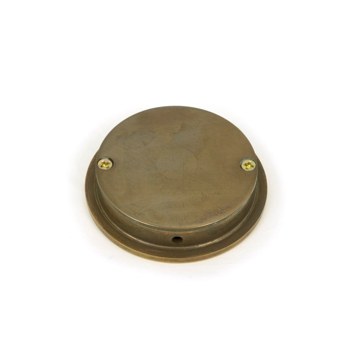 The 60mm Classic Round Flush Pull Handle in Aged Brass Shown from Behind with Supplied Screws