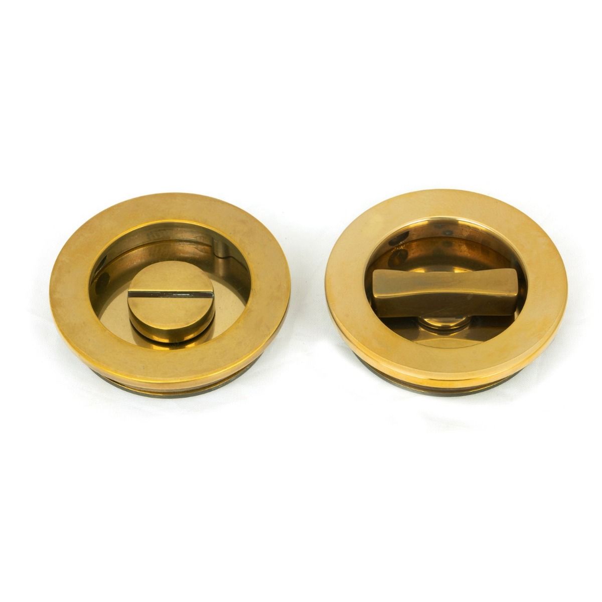 The 60mm Classic Round Sliding Pocket Door Privacy Set in Aged Brass on a White Background Showing Both Sections Side by Side