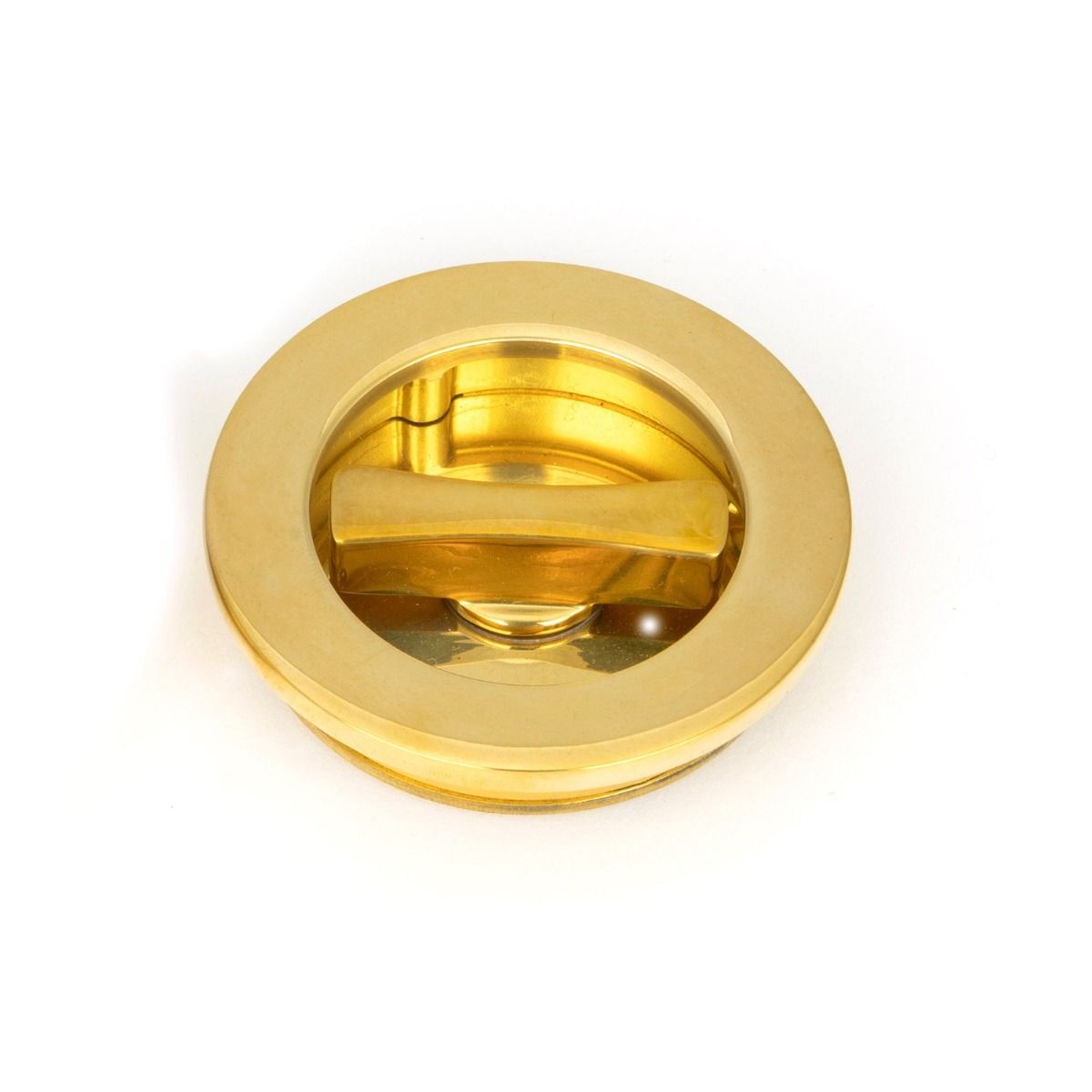 The 60mm Classic Round Sliding Pocket Door Privacy Set in Polished Brass Showing a Close up of the Thumbturn