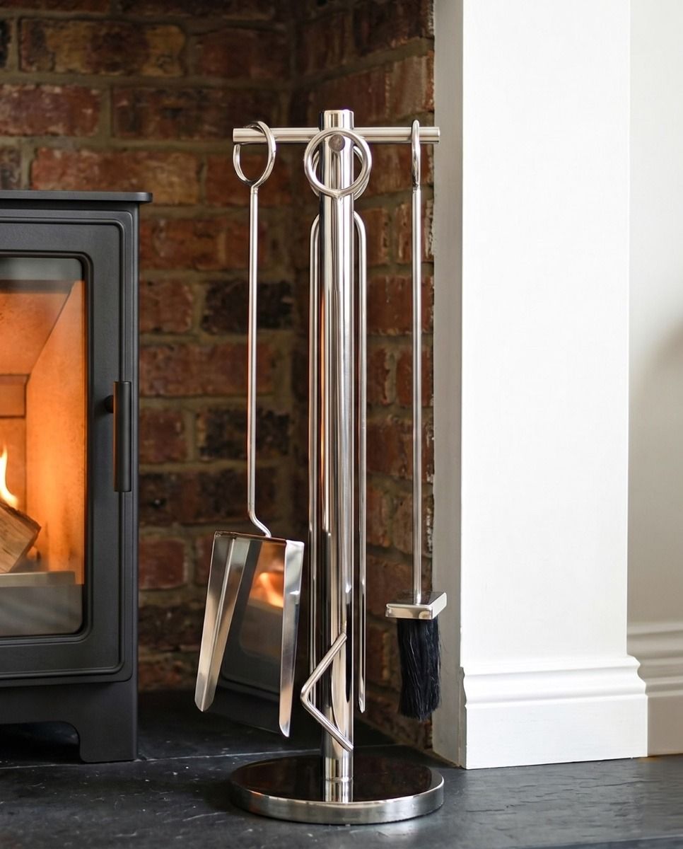 The 62cm “Westgate Park” Polished Chrome Companion Set with a Log Burner Stove in the Background in a Modern Home Interior - Digital Illustration