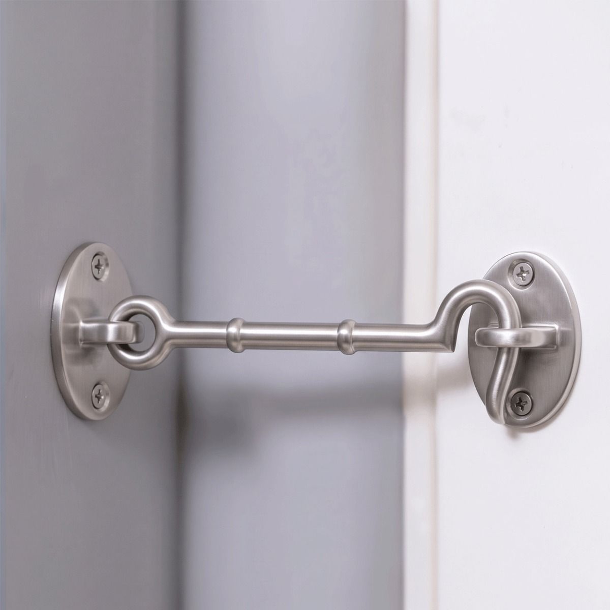 The 6" Satin Chrome Cabin Hook Loose Ring Type on a White Background Used to Hold a White Door Open - Digital Illustration