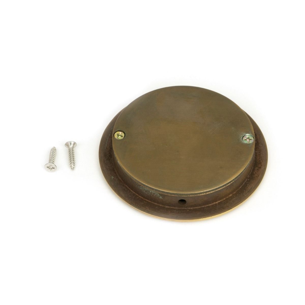 The 75mm Art Deco Round Flush Pull Handle in Aged Brass Shown from Behind with Supplied Screws