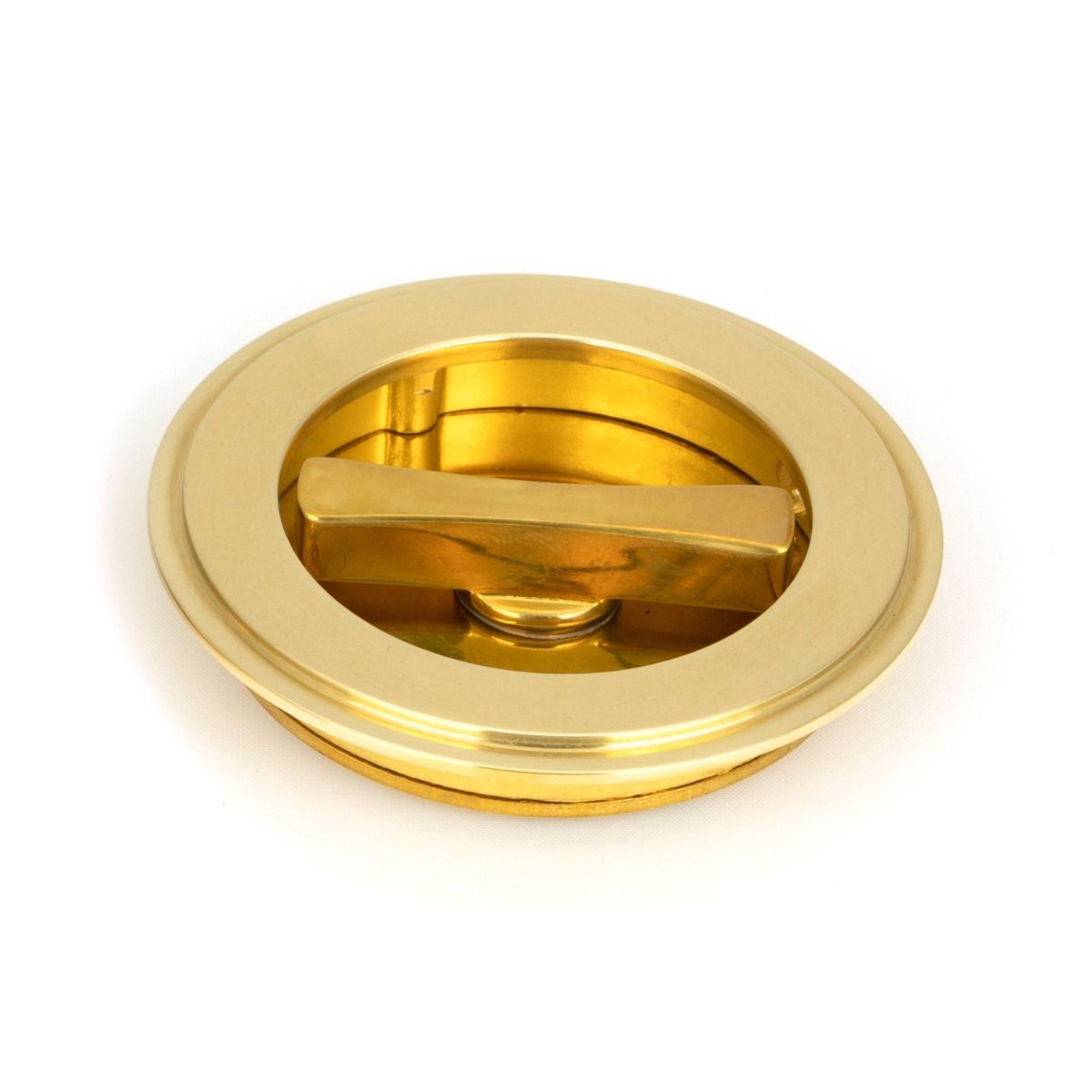 The 75mm Art Deco Round Sliding Pocket Door Privacy Set in Polished Brass Showing a Close up of the Thumbturn