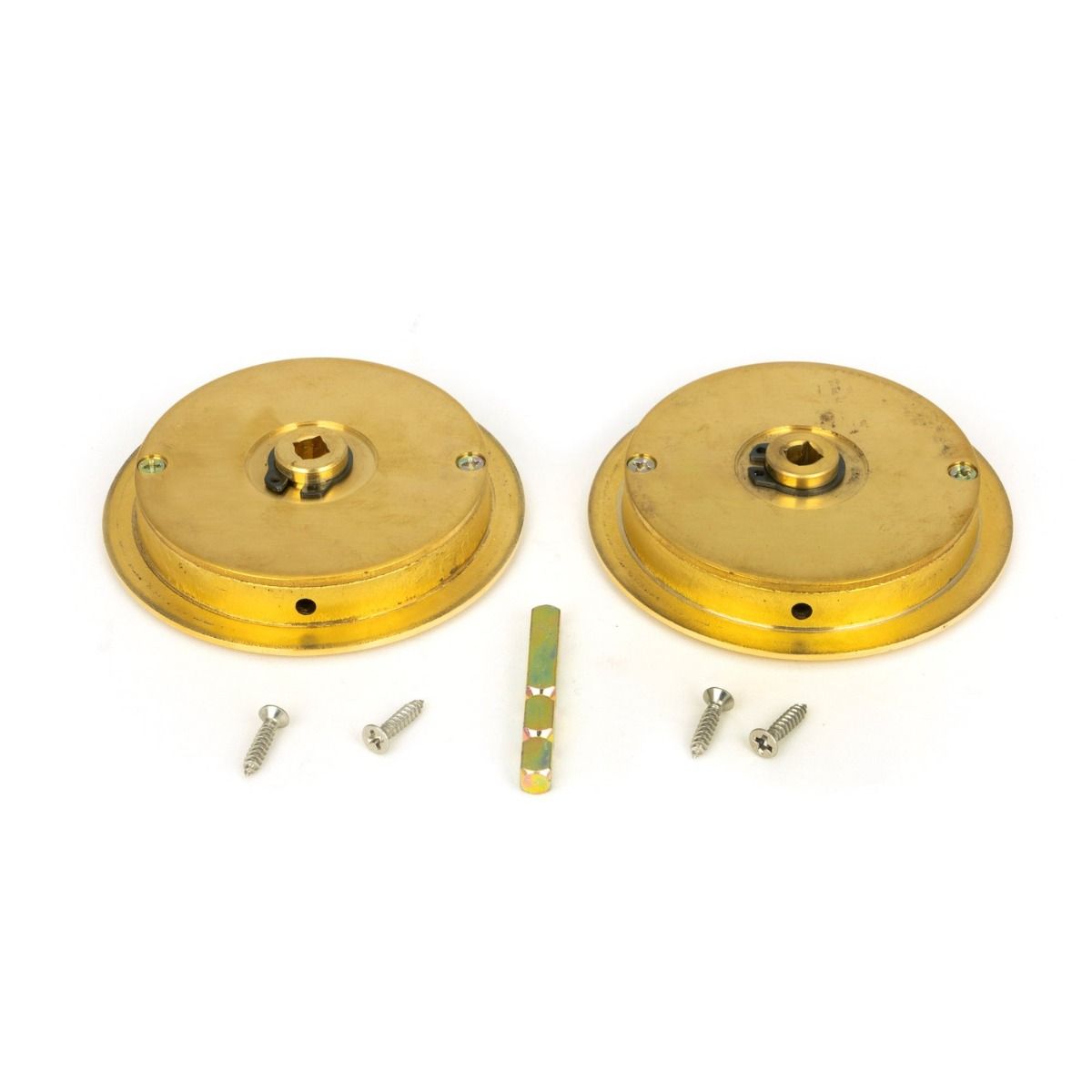 The 75mm Art Deco Round Sliding Pocket Door Privacy Set in Polished Brass Shown with Supplied Spindle and Fitting Screws