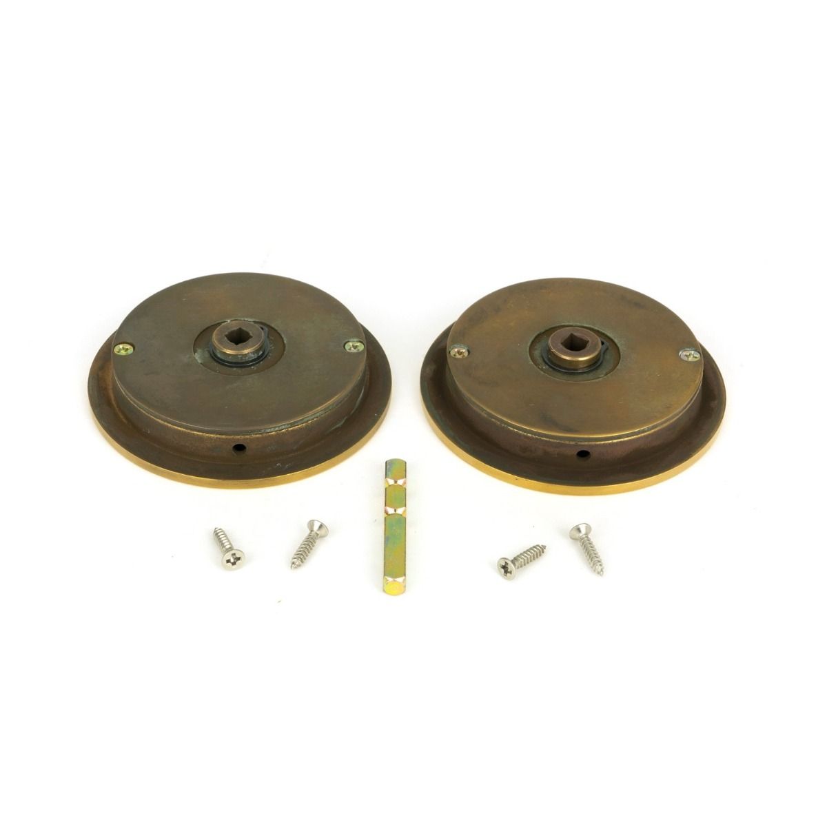 The 75mm Classic Round Sliding Pocket Door Privacy Set in Aged Brass Shown from Behind with Spindle and Screws