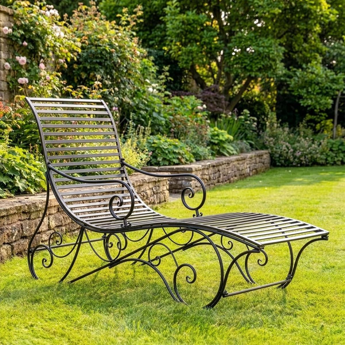 The "Windsor" Scrollwork Wrought Iron Sun Lounger in a Black Finish Positioned on a Sunny Garden Lawn - Digital Illustration 