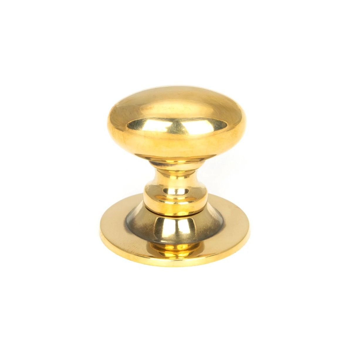 The Aged Brass 40mm Traditional Oval Cabinet Knob Shown Upright on a White Background