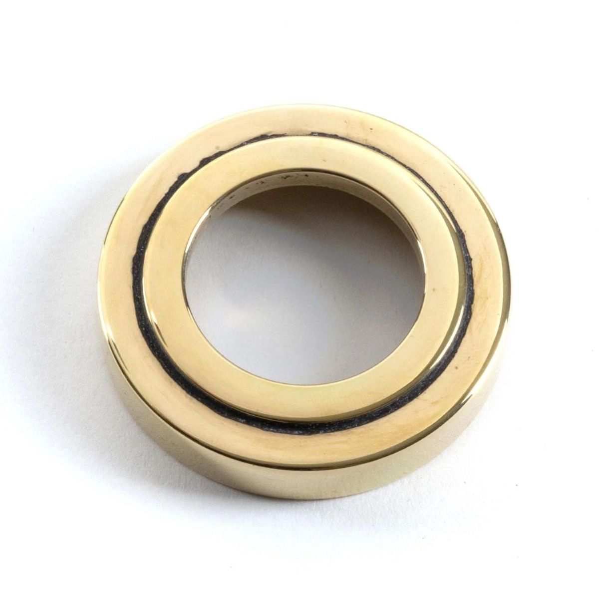 The Aged Brass Art Deco Rose on a White Background 