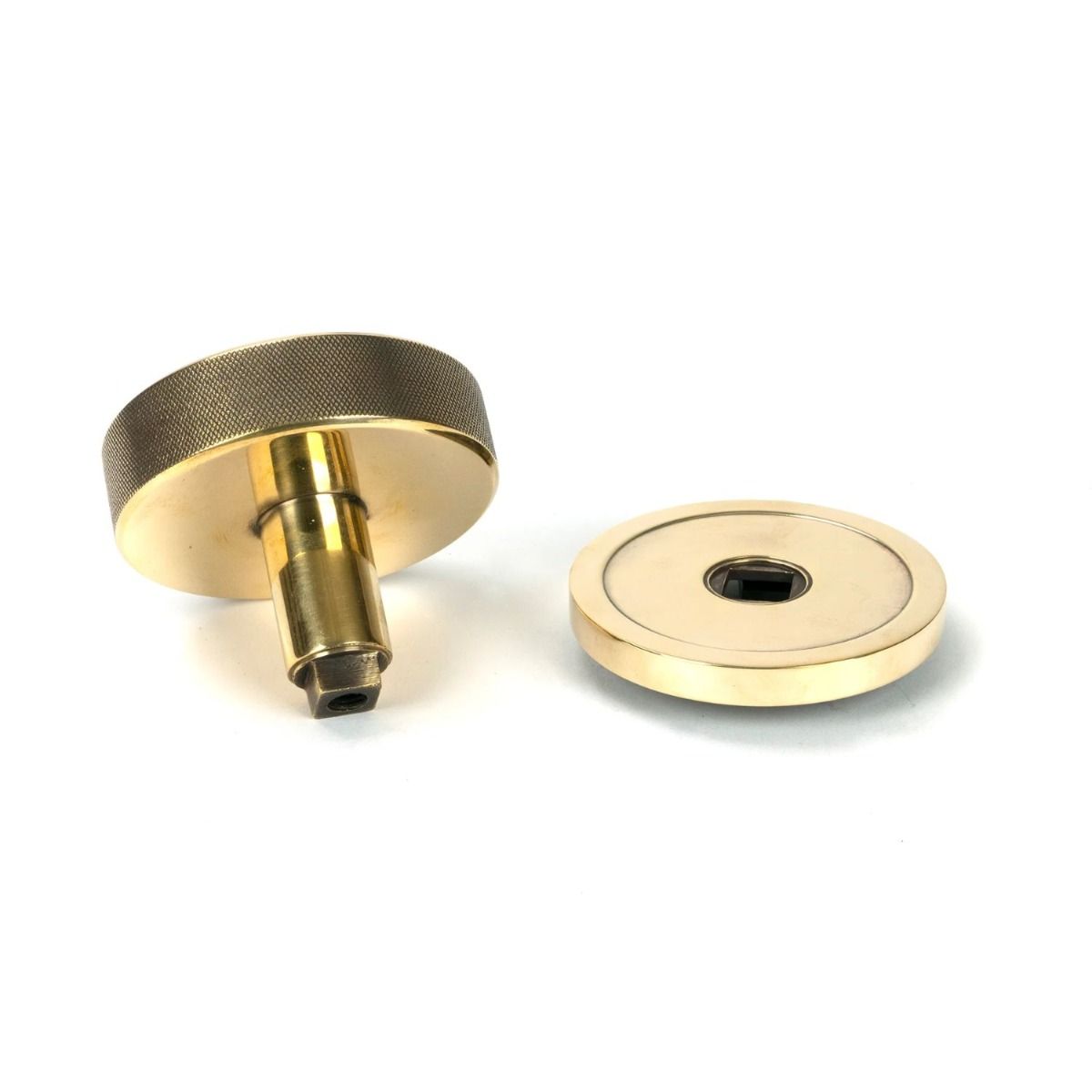 The Aged Brass Knurled Centre Door Knob on Plain Rose Displayed in Separate Sections 