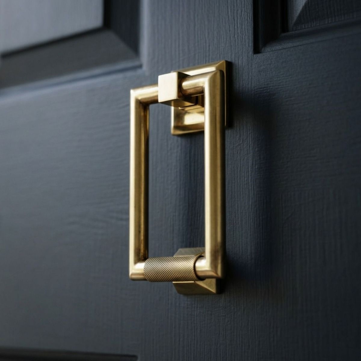 The Aged Brass Modern Knurled Rectangular Door Knocker on a Blue Door on a Modern Property - Digital Illustration