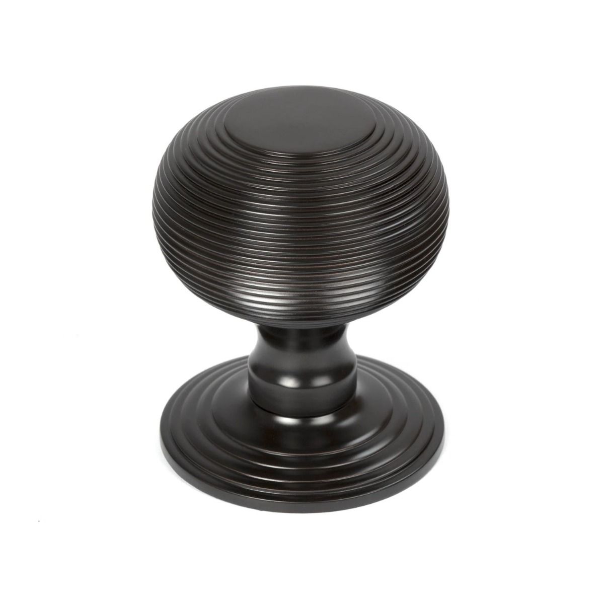 The Aged Bronze Traditional Beehive Centre Door Knob Shown Upright on a White Background 