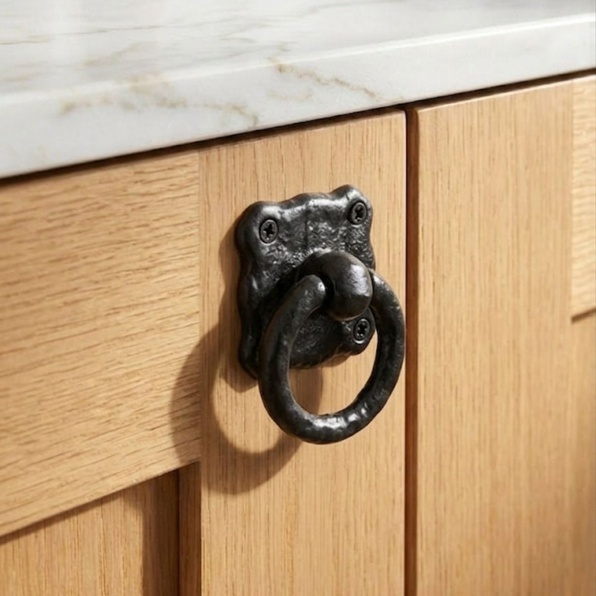 The Antique Black Iron Ring Cabinet Pull Handle Mounted on a Wooden Kitchen Cabinet in a Contemporary Home - Digital Illustration