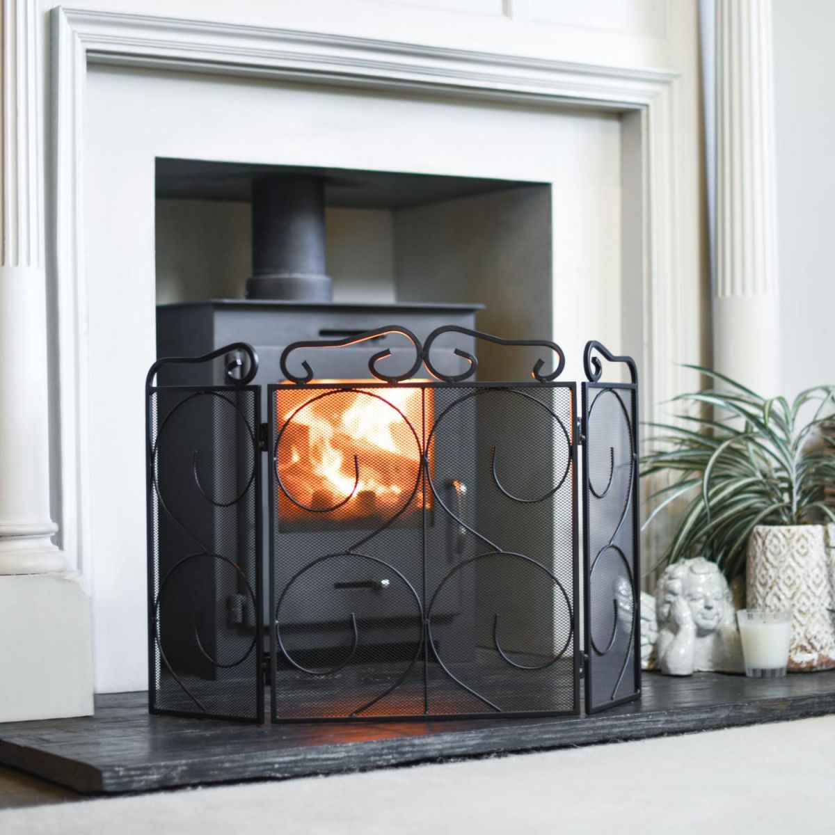 "The Antiquitas" Three Fold Fire Guard In A Fireplace Setting