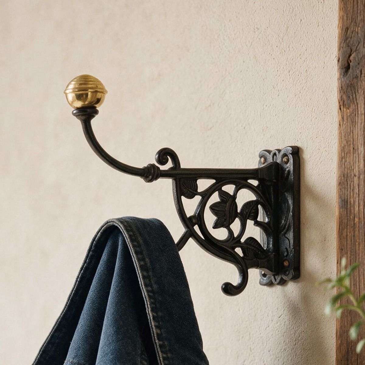 The Antonietta Double Hook in an Entrance Hallway Shown Close up with a Coat Hung on it - Digital Illustration 