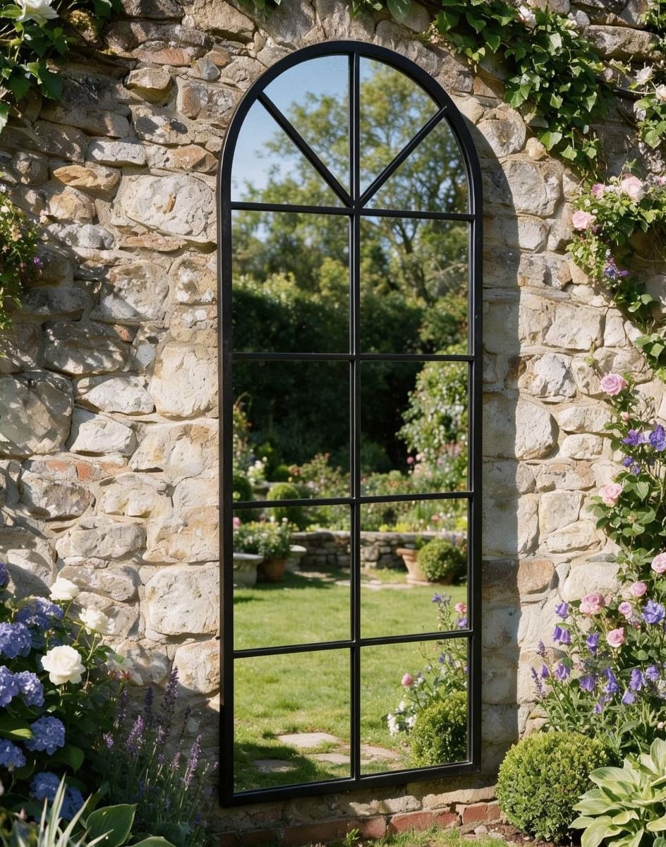 The Arched Garden Mirror with a Black Frame Mounted on a Traditional Stone Garden Wall - Digital Illustration