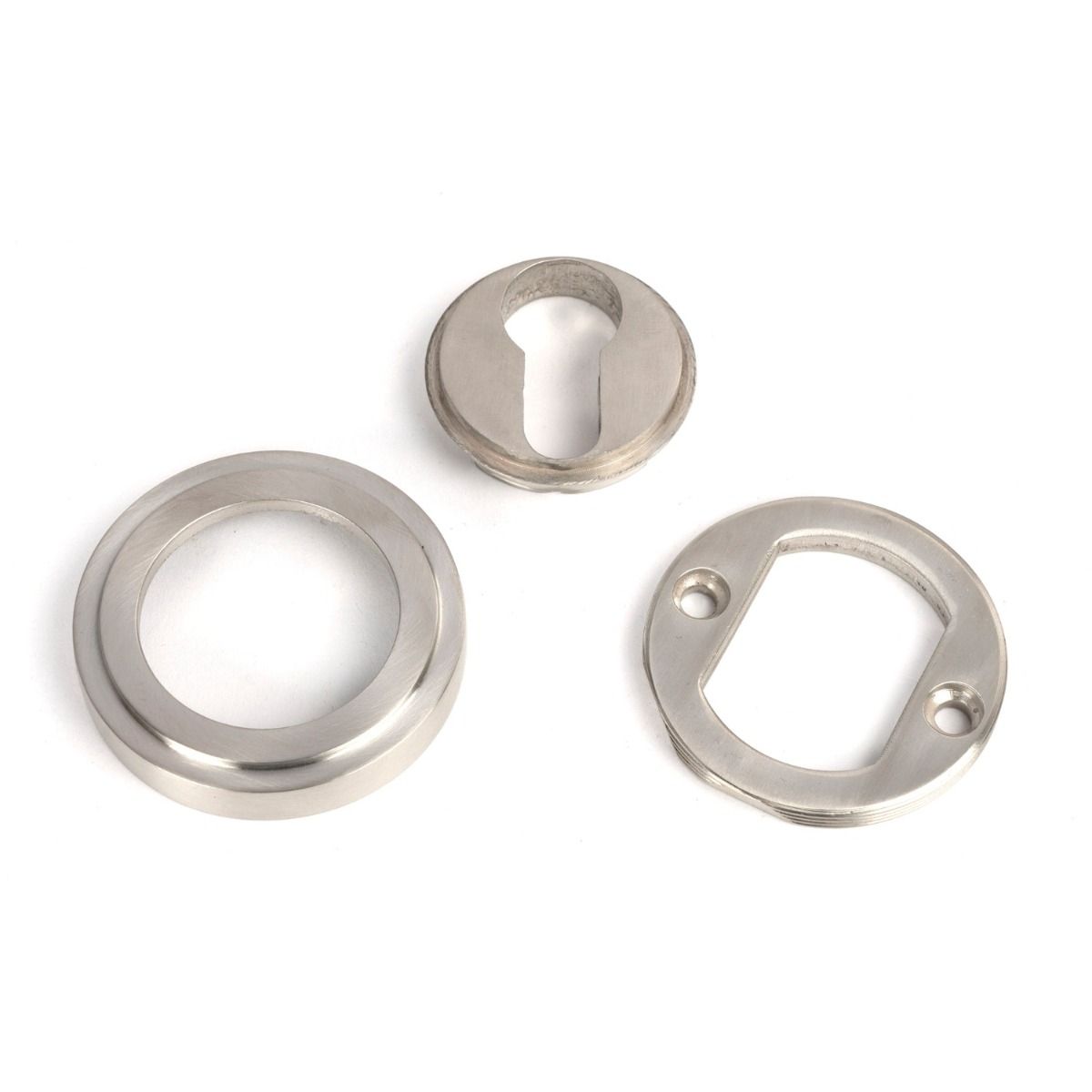 The Art Deco Concealed Euro Keyhole Escutcheon in Satin Stainless Steel Shown with all Components on a White Background