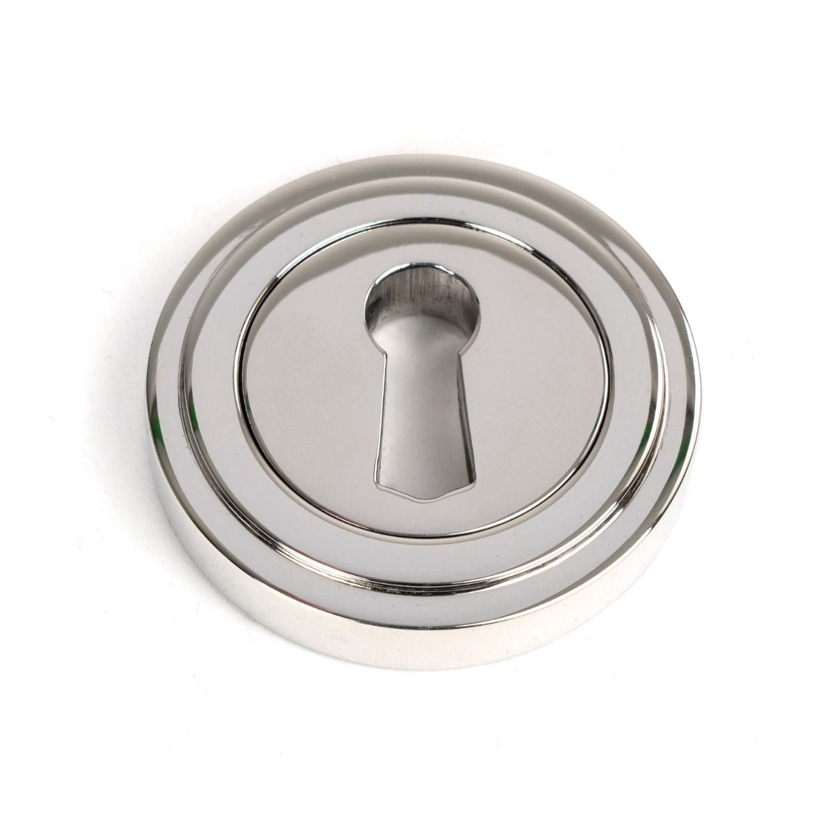 The Art Deco Concealed Standard Keyhole Escutcheon in Polished Stainless Steel Shown on a White Background